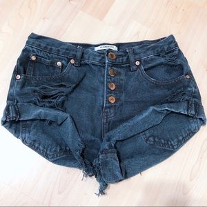 Distressed navy blue shorts